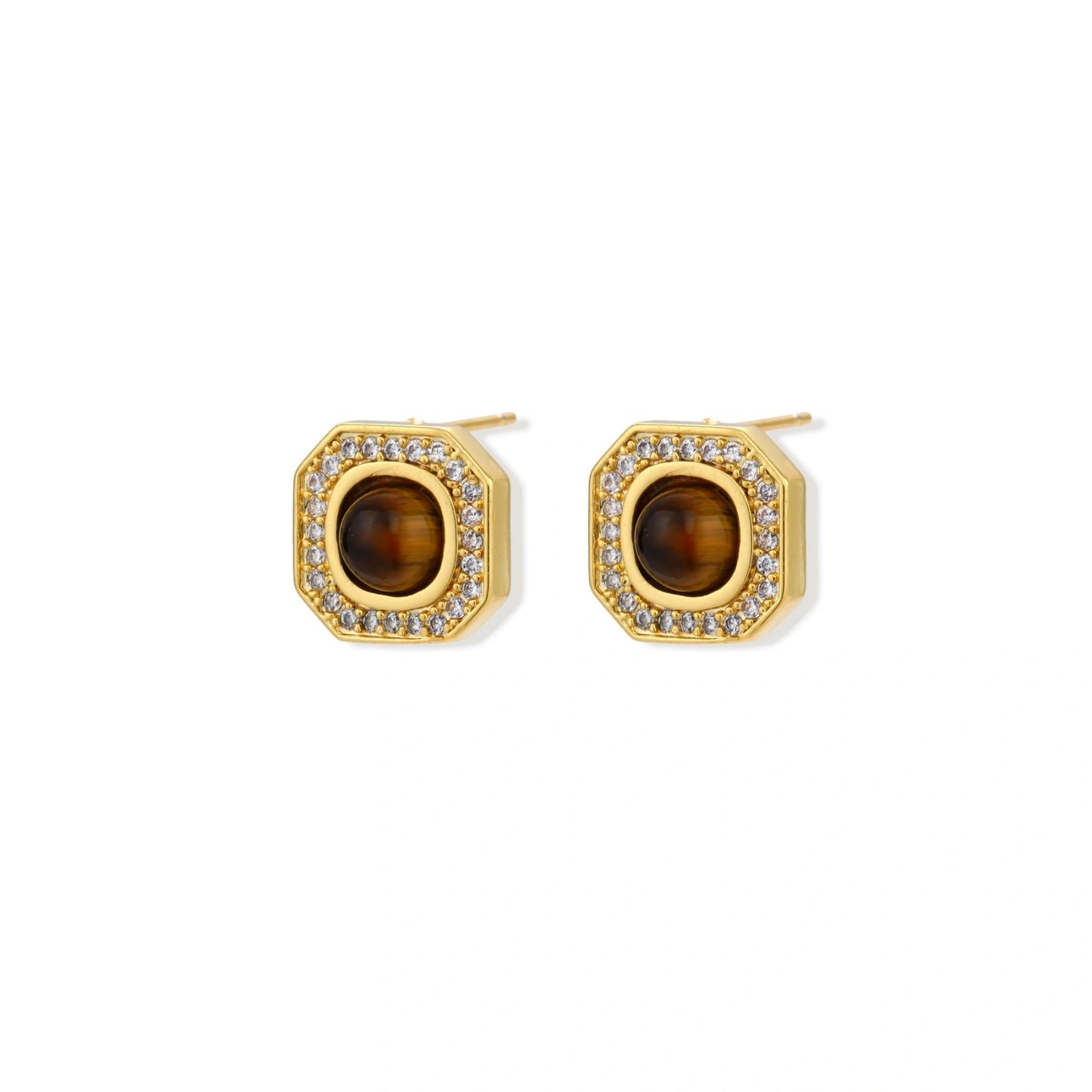 Gold-plated octagonal stud earrings with brown tiger's eye centers and cubic zirconia border on cream background.