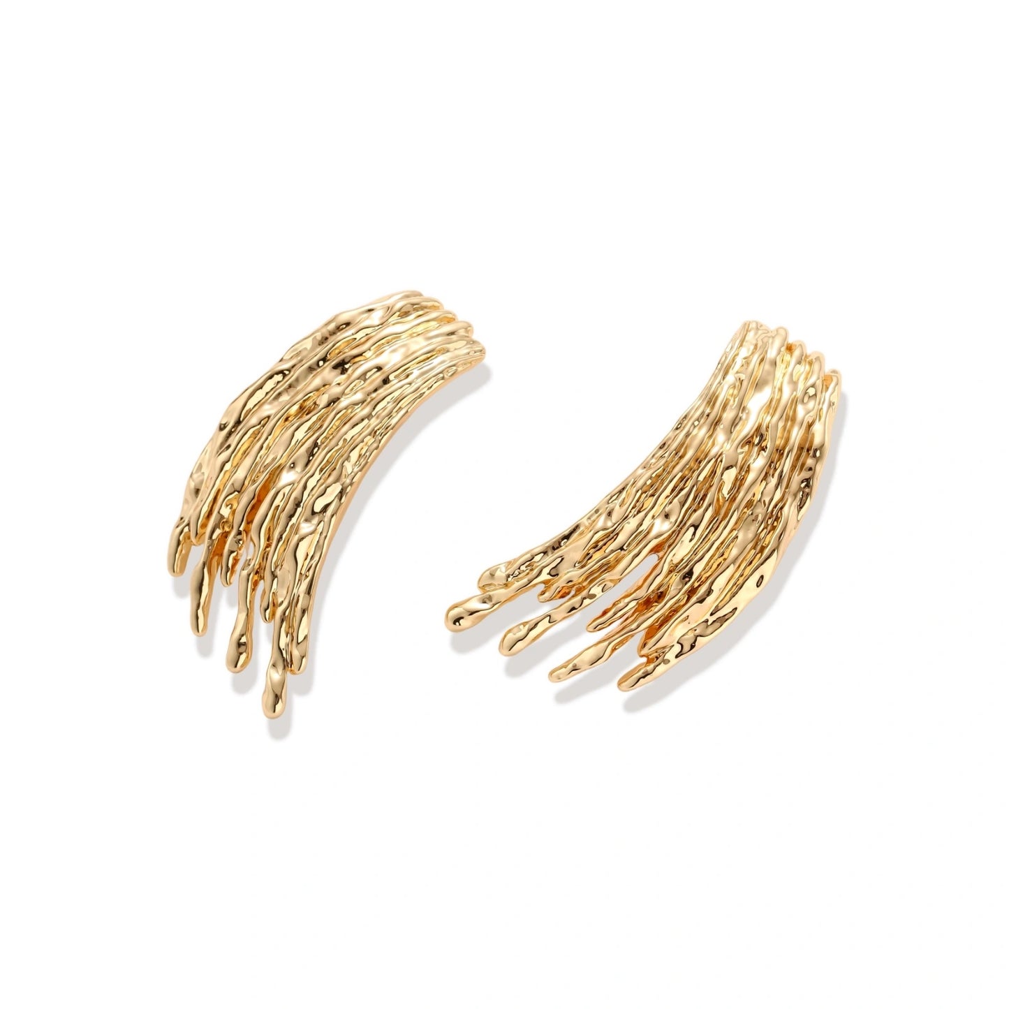 Flowing fringe earrings with cascading curved metal elements in gold tone, showing dimensional movement and sculptural design.
