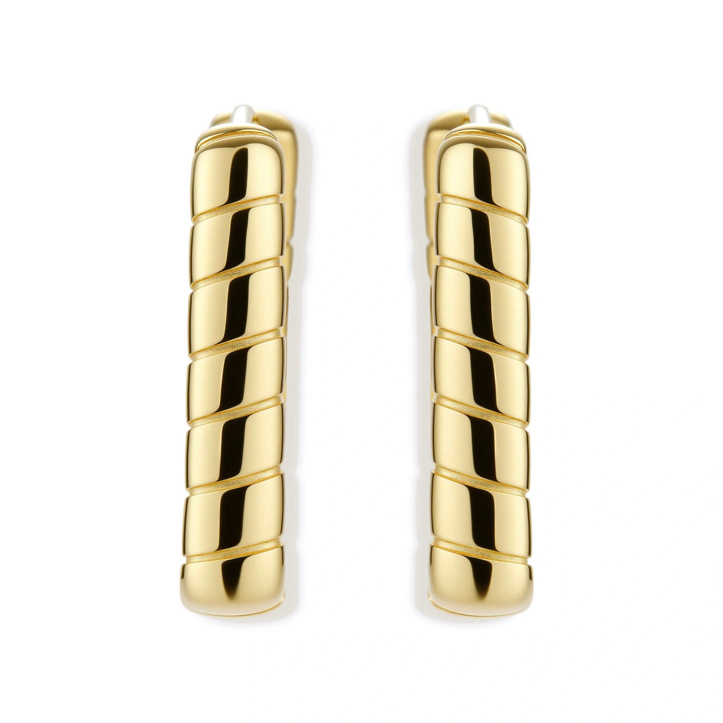 Chunky segmented gold-plated huggie hoop earrings with bamboo-inspired geometric design on white background.
