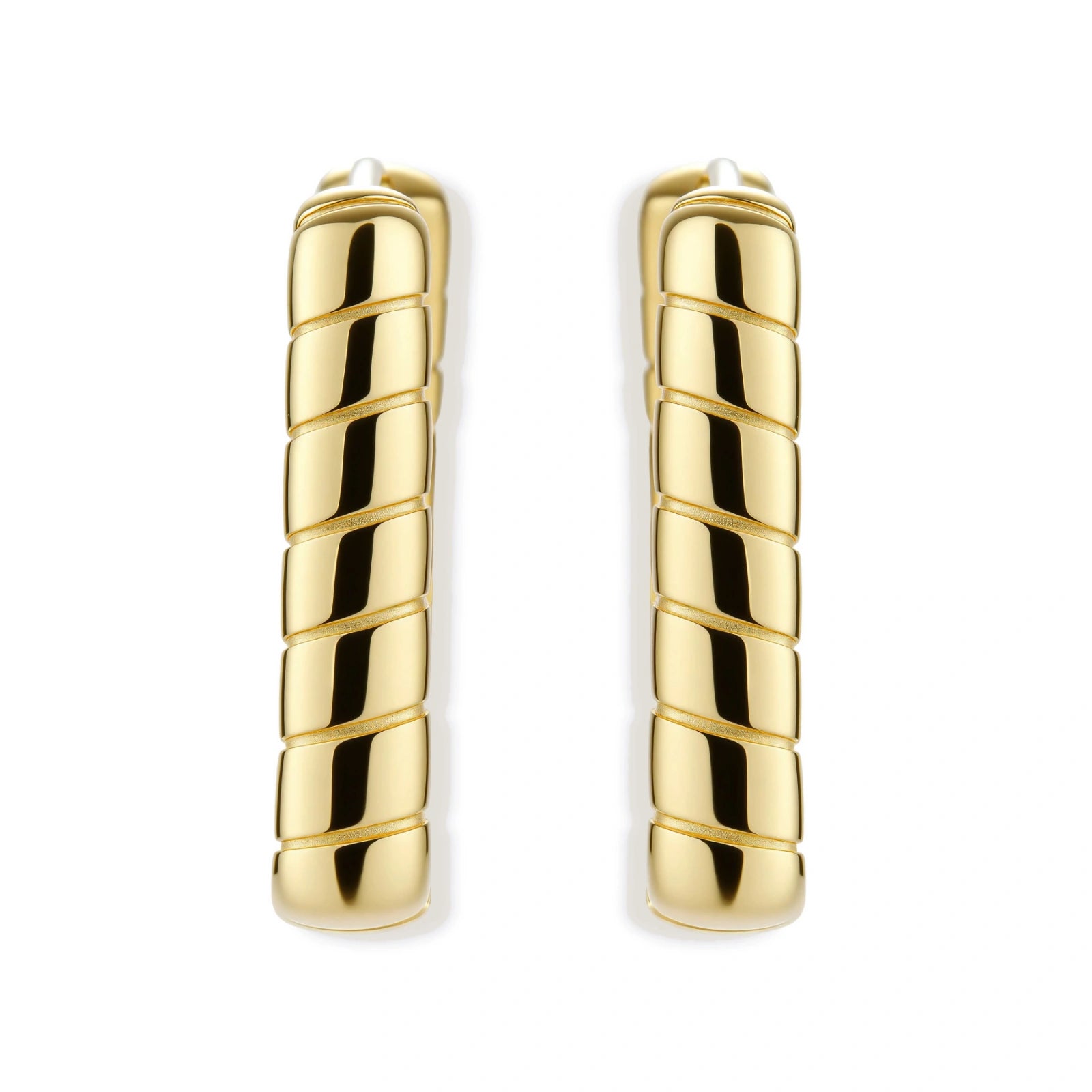 Chunky segmented gold-plated huggie hoop earrings with bamboo-inspired geometric design on white background.