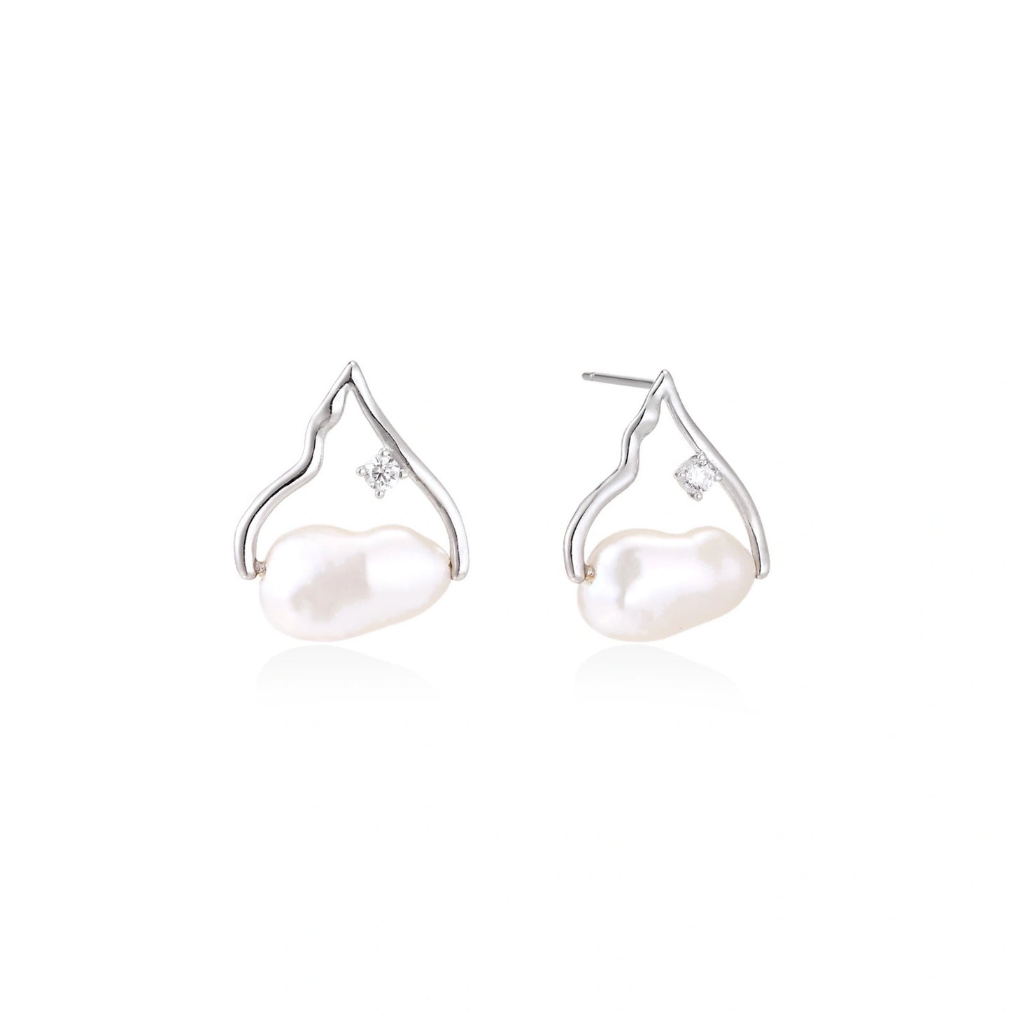 Silver mountain outline studs with baroque pearl and diamond accent on white background