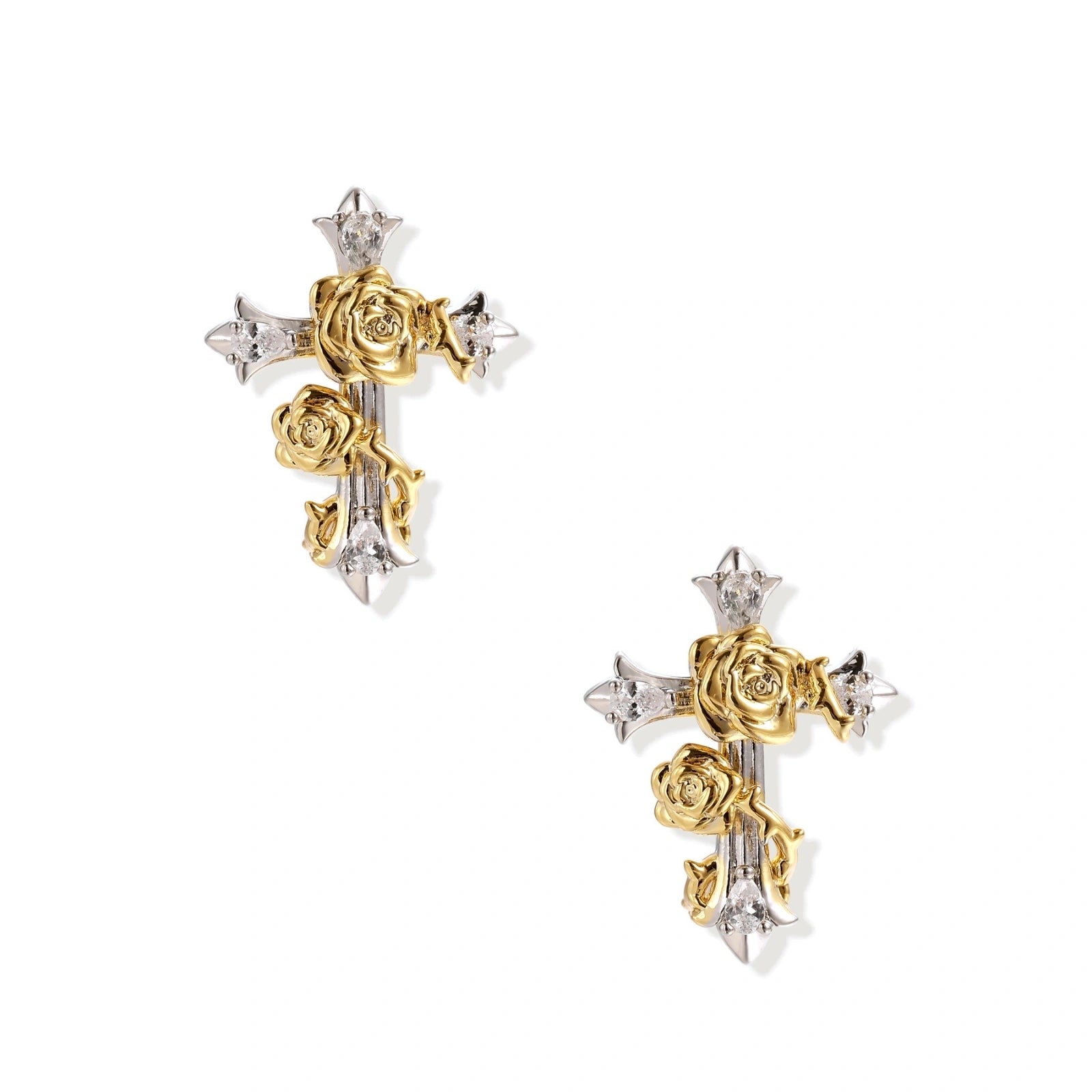 Gold-plated cross earrings with dimensional roses and crystal details on cream background, 18k gold over brass construction.