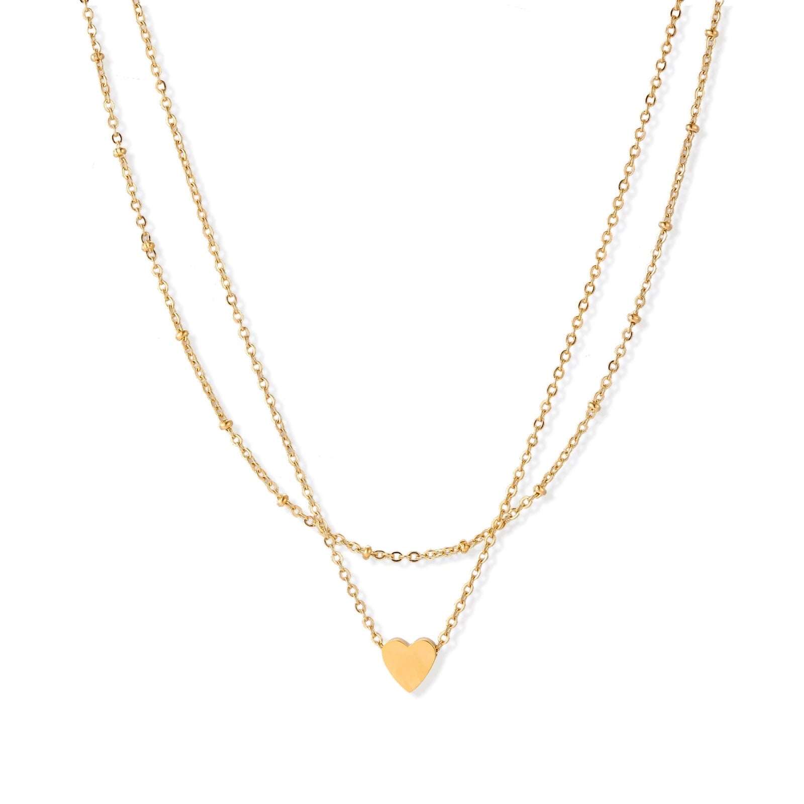 Delicate double-chain gold necklace with tiny heart pendant on cream background