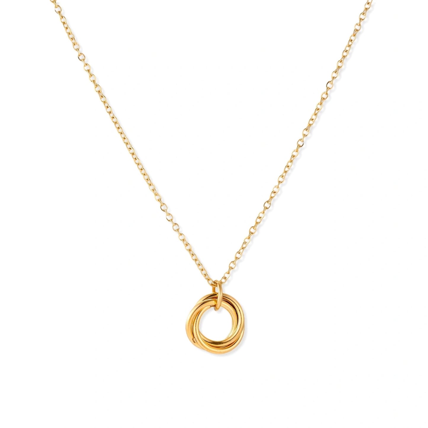 Delicate gold-plated necklace with three interlocking circle rings forming a minimalist knot pendant on cream background