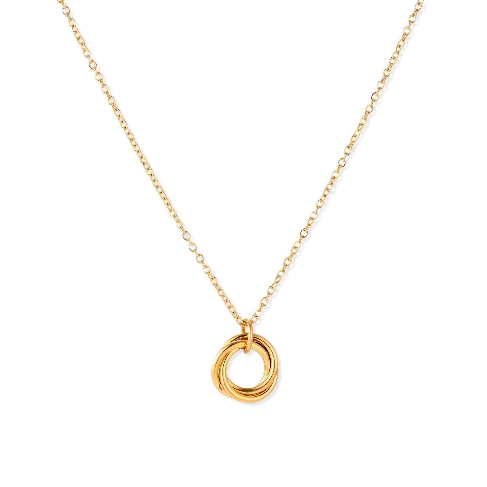 Delicate gold-plated necklace with three interlocking circle rings forming a minimalist knot pendant on cream background