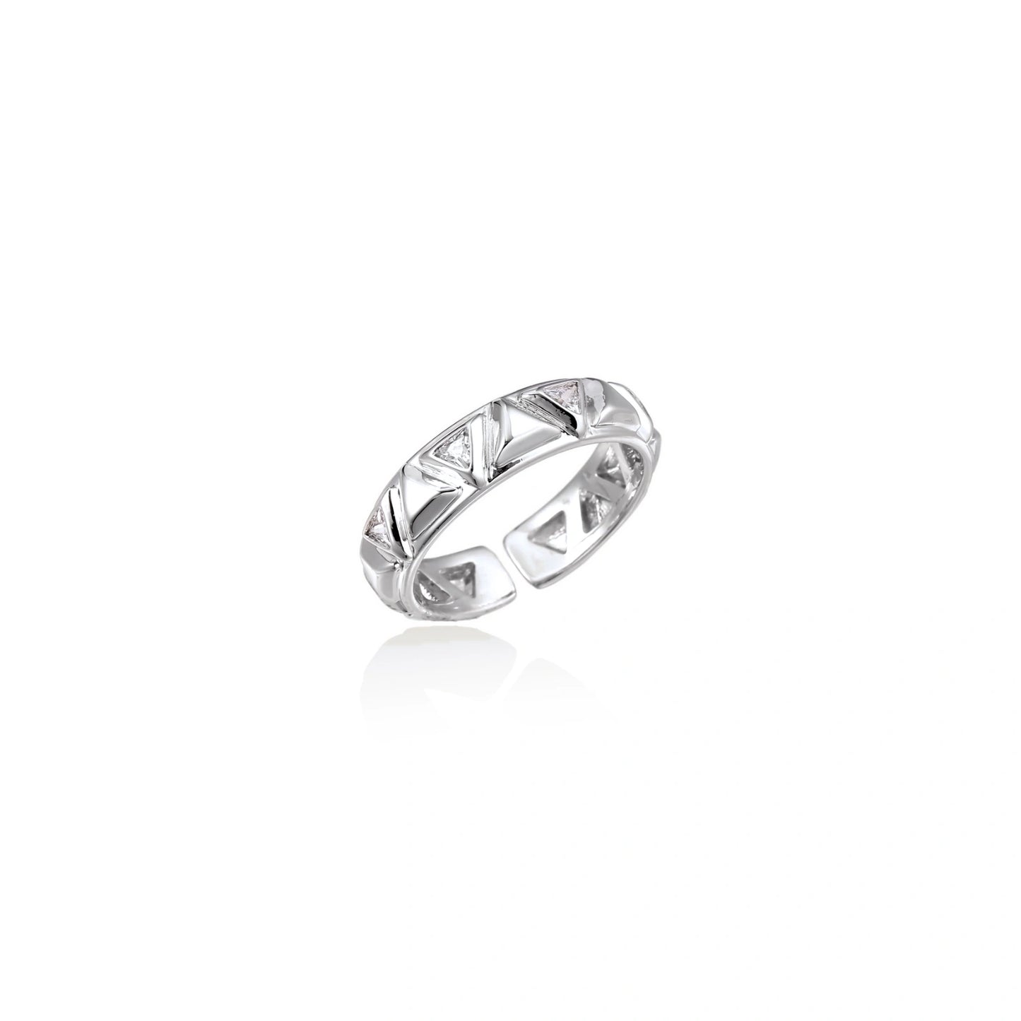 White gold adjustable ring with geometric triangle cutouts and zirconia stones on cream background