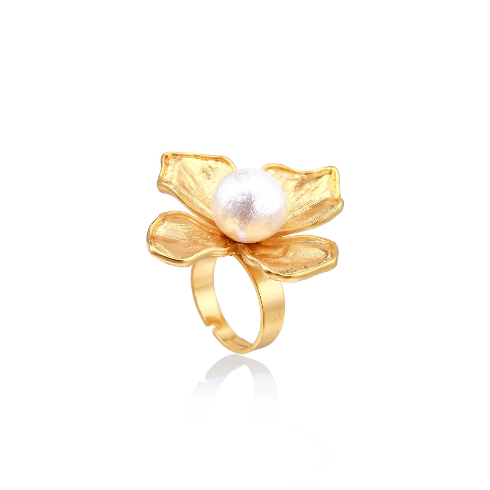 Gold-plated flower ring with textured petals and white cotton pearl center on cream background