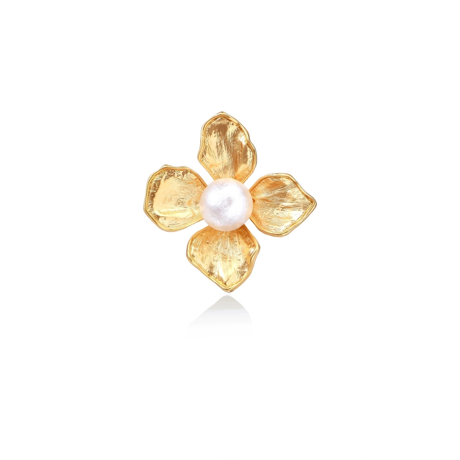 Gold-plated flower ring with textured petals and white cotton pearl center on cream background