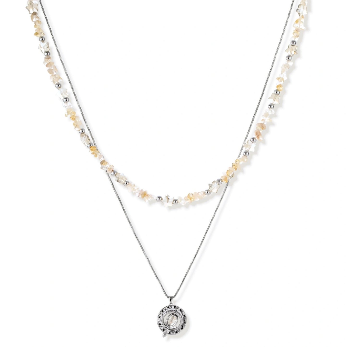 Complete jewelry set featuring citrine stone chips, silver beads, and cosmic circle pendants on cream background.