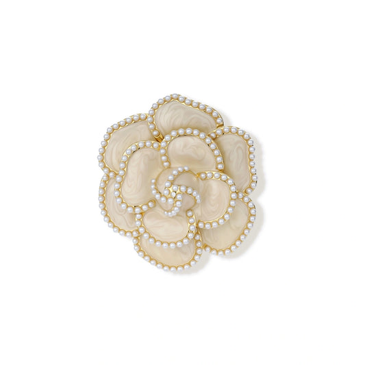 Elegant cream-colored rose brooch with gold plating, zirconia stones, and pearl-like border details on neutral background.
